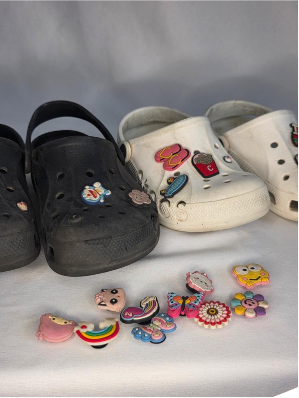 Two Pairs Crocs White Size Junior 1 & Black Junior 3 with Charms
